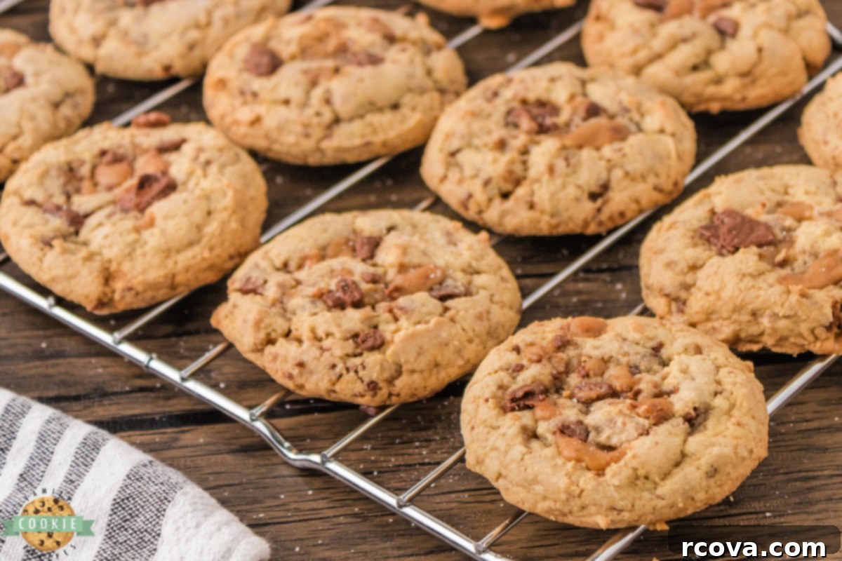 Homemade Heath Bar Crunch Cookies 14 A fresh batch of Heath Bar Cookies with visible toffee pieces.