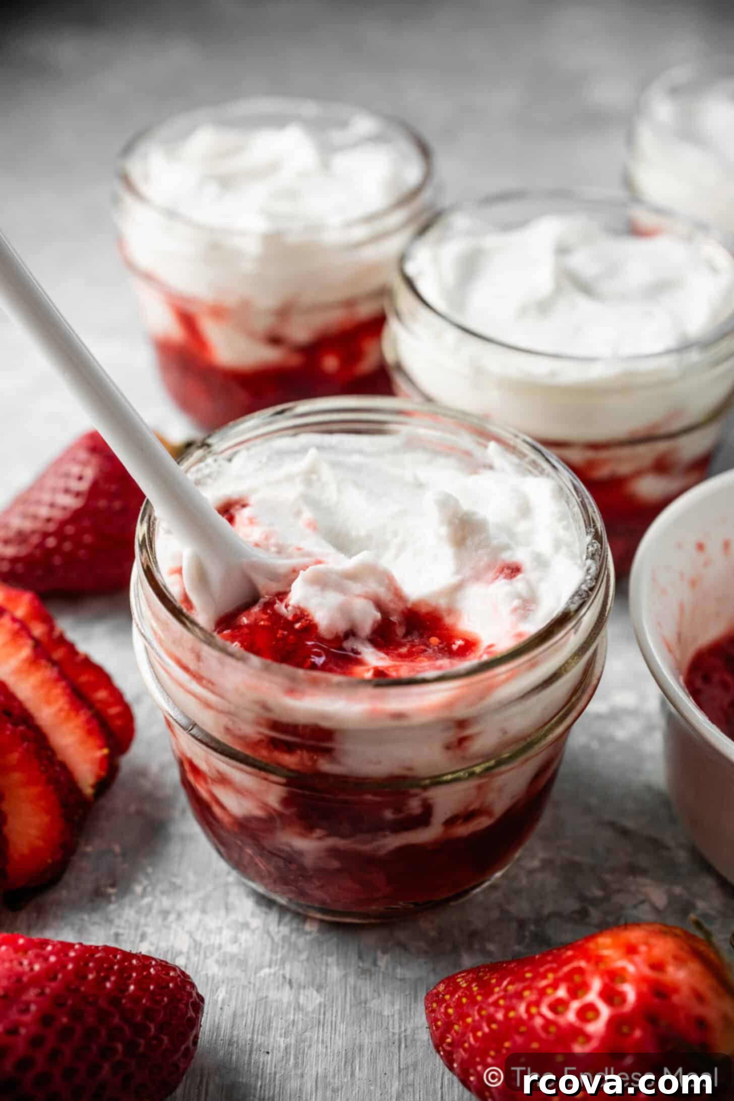 25+ Healthy Grab and Go Work Snacks 16 Coconut Yogurt Recipe via The Endless Meal, served in a glass bowl.