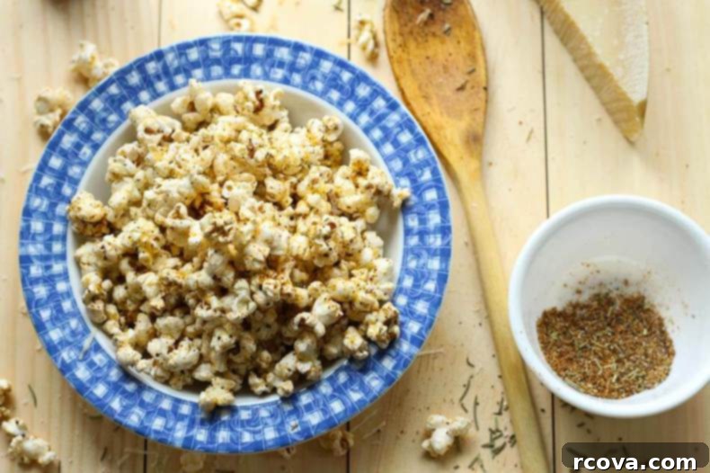 25+ Healthy Grab and Go Work Snacks 25 Easy Spicy Garlic Parmesan Popcorn in a bowl.