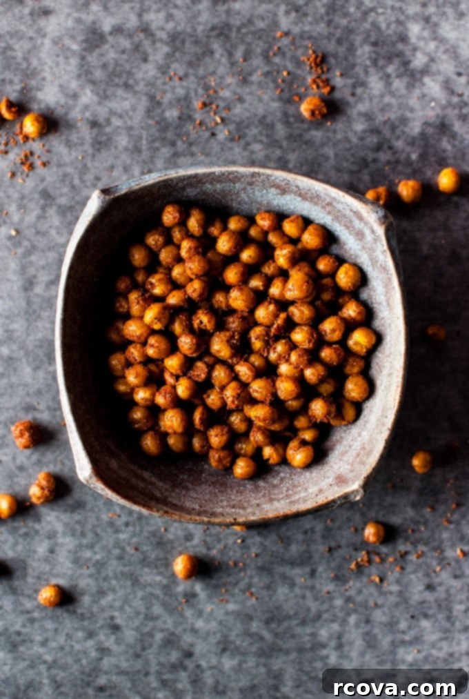 25+ Healthy Grab and Go Work Snacks 28 Southwest Spiced Crunchy Chickpeas via Salt and Lavender, served in a bowl.