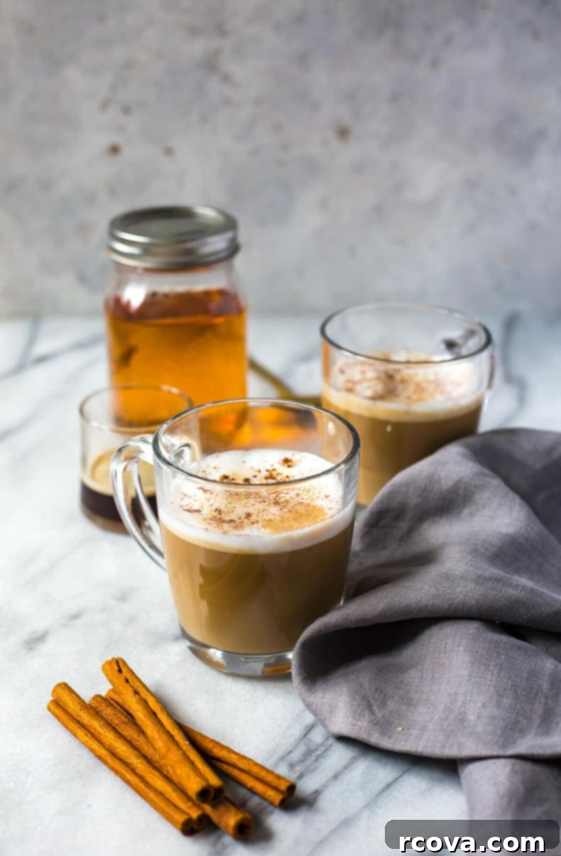 Cinnamon Dolce Latte Starbucks Copycat 4 Close-up of a homemade cinnamon dolce syrup with cinnamon sticks, ready for latte preparation.