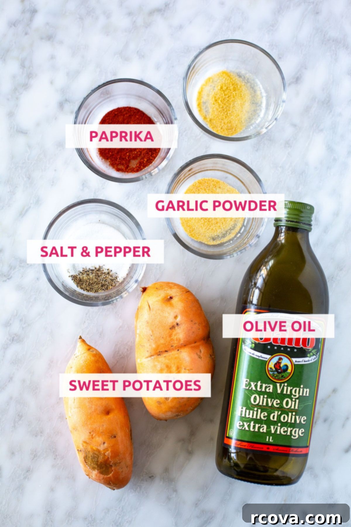 Guilt-Free Air Fryer Sweet Potato Gold 4 Ingredients for making sweet potato fries in the air fryer: paprika, garlic powder, salt & pepper, sweet potatoes, and olive oil, along with chipotle in adobo and sour cream for the sauce