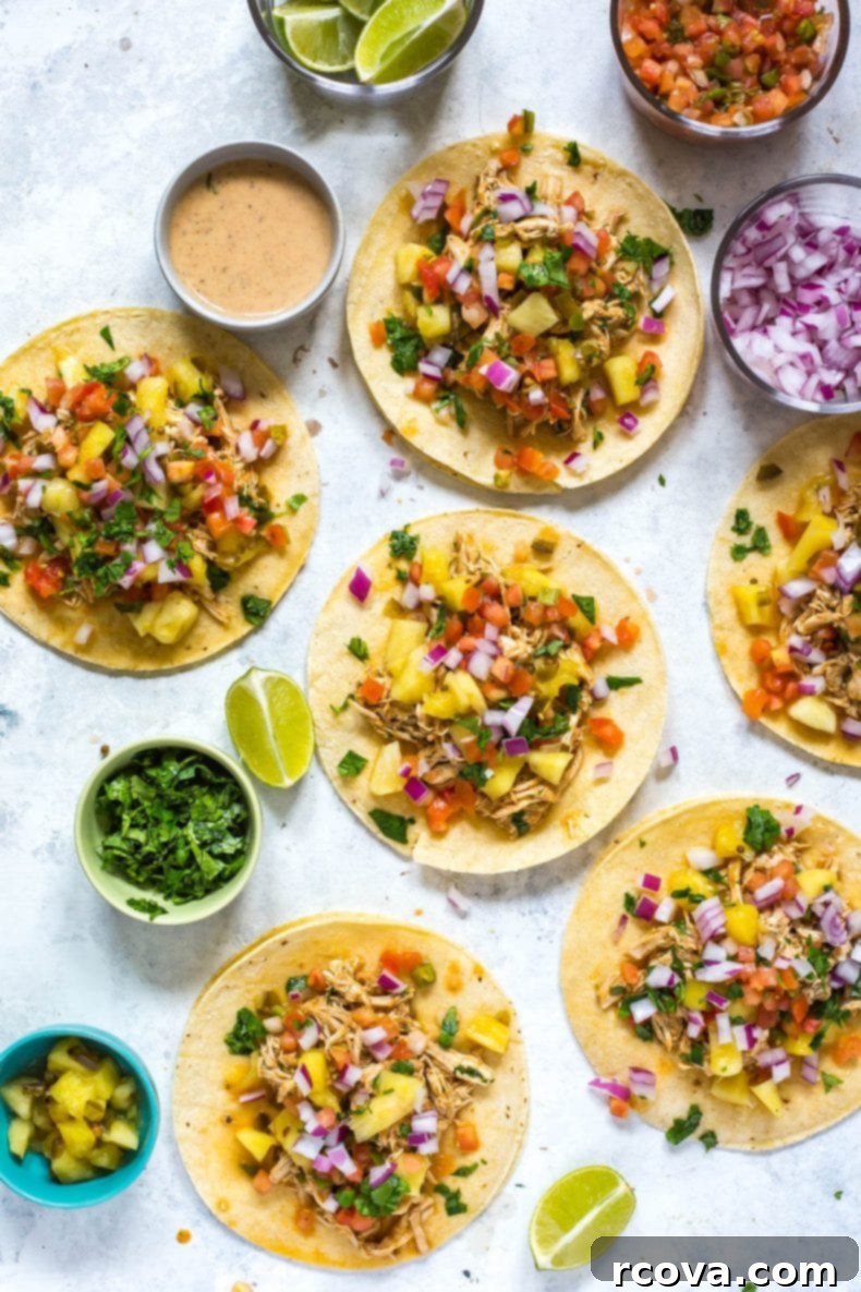 Tropical Crockpot Chicken Tacos with Pineapple Salsa 2 Close-up of delicious Crockpot Chicken Tacos with fresh pineapple salsa