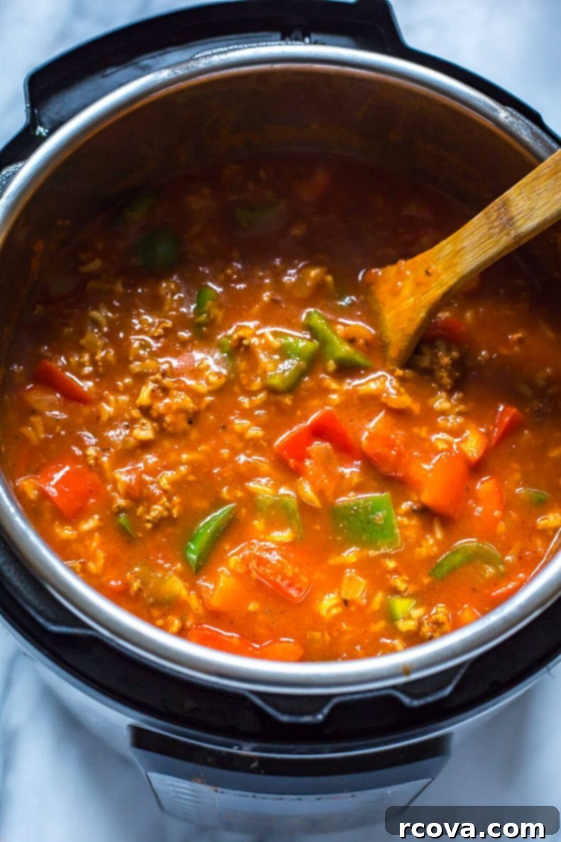 Instant Pot Unstuffed Pepper Soup 6 Overhead shot of Instant Pot Stuffed Pepper Soup with a spoon.