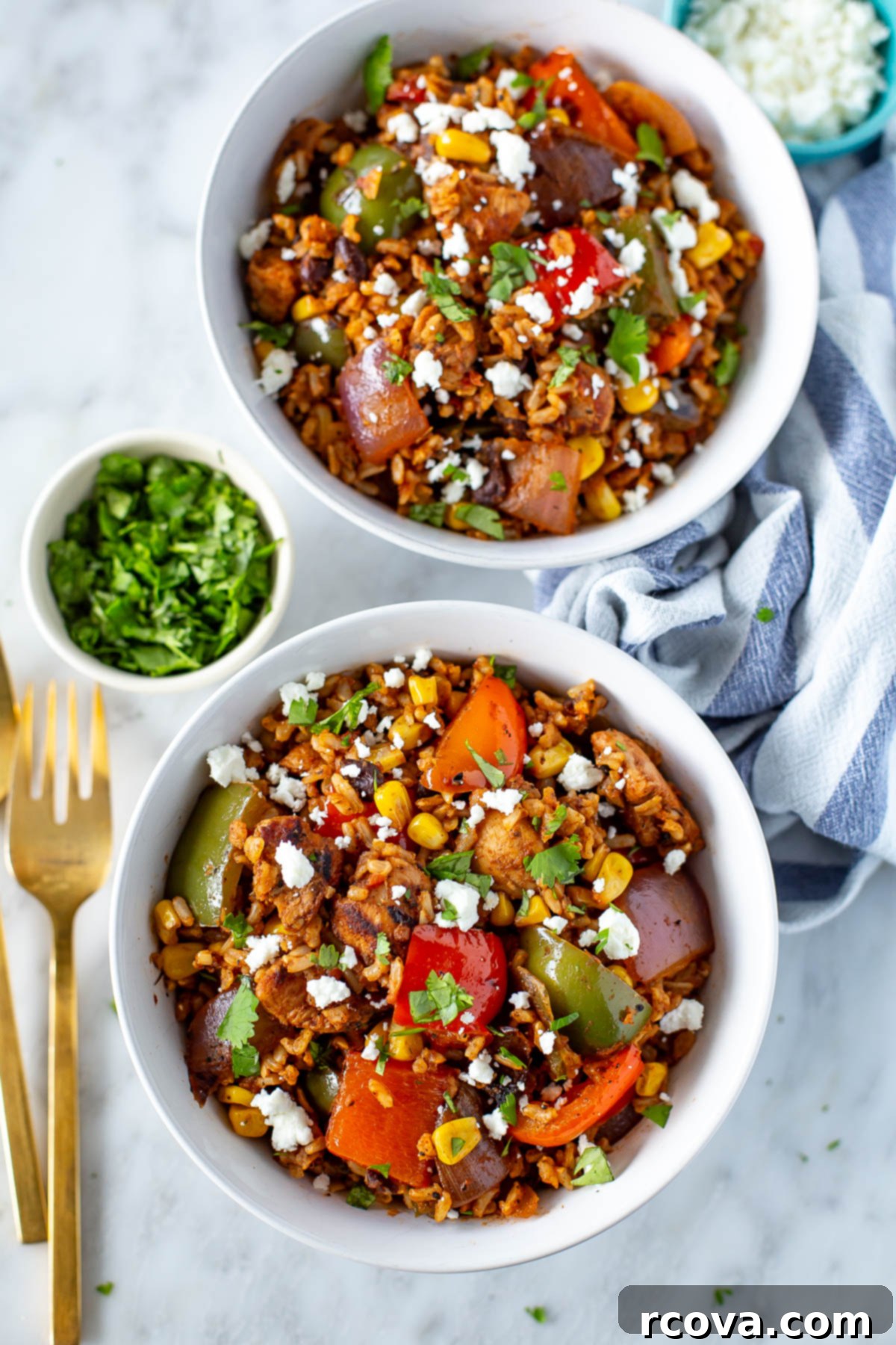 Effortless Weekly Meal Prep 14 An overhead shot showcasing two bowls of vibrant fiesta chicken and rice, ready for a flavorful meal prep lunch.