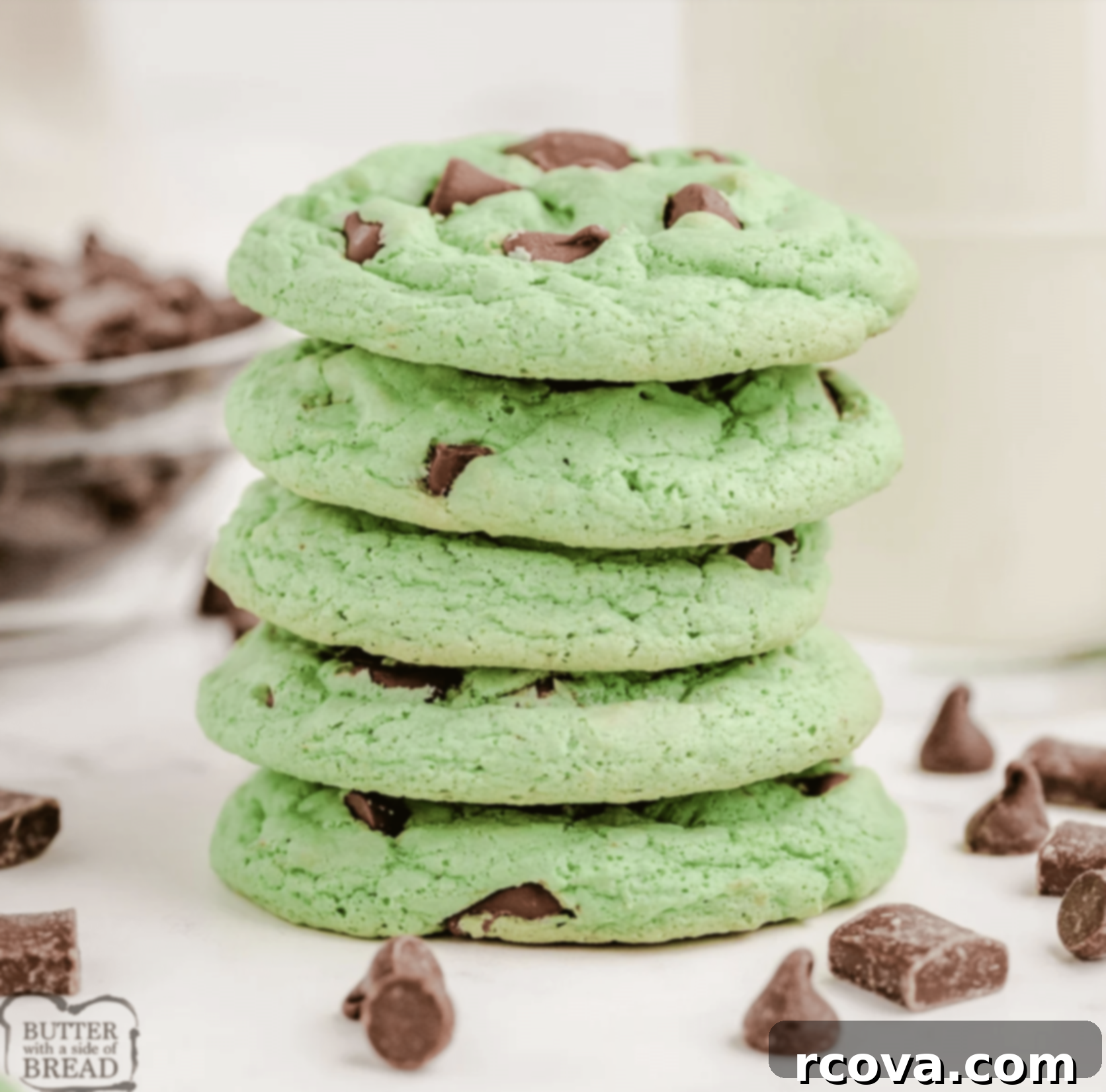 Ultimate Chocolate Mint Cookies 3 Close-up of fluffy Mint Chocolate Chip Cookies with visible chocolate chunks and a light green hue.