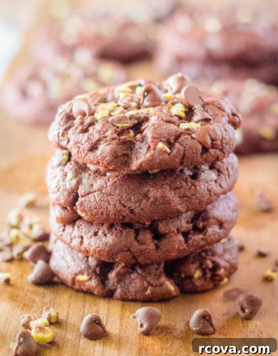 Ultimate Chocolate Mint Cookies 9 Rich, fudgy Mint Chocolate Brownie Cookies with a chewy edge and soft center, showcasing chocolate and mint chips.