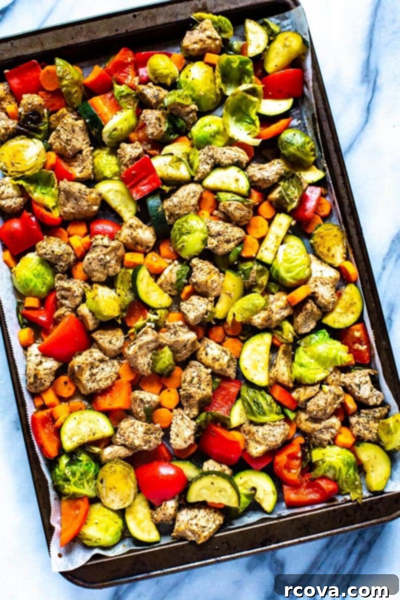 This Sheet Pan Balsamic Chicken is a delicious, healthy weeknight dinner idea. It comes together on one pan, ready to eat in 30 minutes! Leftovers won’t be a problem with this flavourful chicken dinner - turn them into meal prep lunches for the week! Sheet Pan Balsamic Chicken with roasted vegetables for a healthy, quick dinner