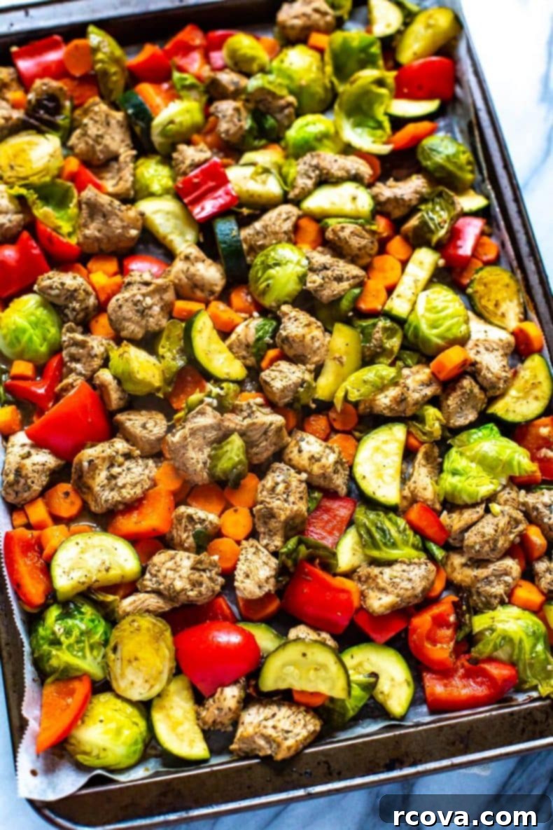 This Sheet Pan Balsamic Chicken is a delicious, healthy weeknight dinner idea. It comes together on one pan, ready to eat in 30 minutes! Leftovers won’t be a problem with this flavourful chicken dinner - turn them into meal prep lunches for the week! one-pan Balsamic Chicken dinner on a baking sheet