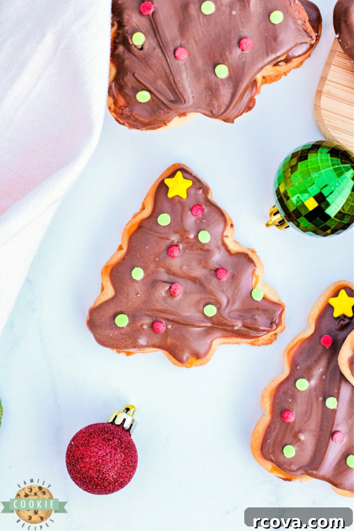 Festive Twix Christmas Tree Cookies 5 Homemade twix cookies in the shape of Christmas trees.