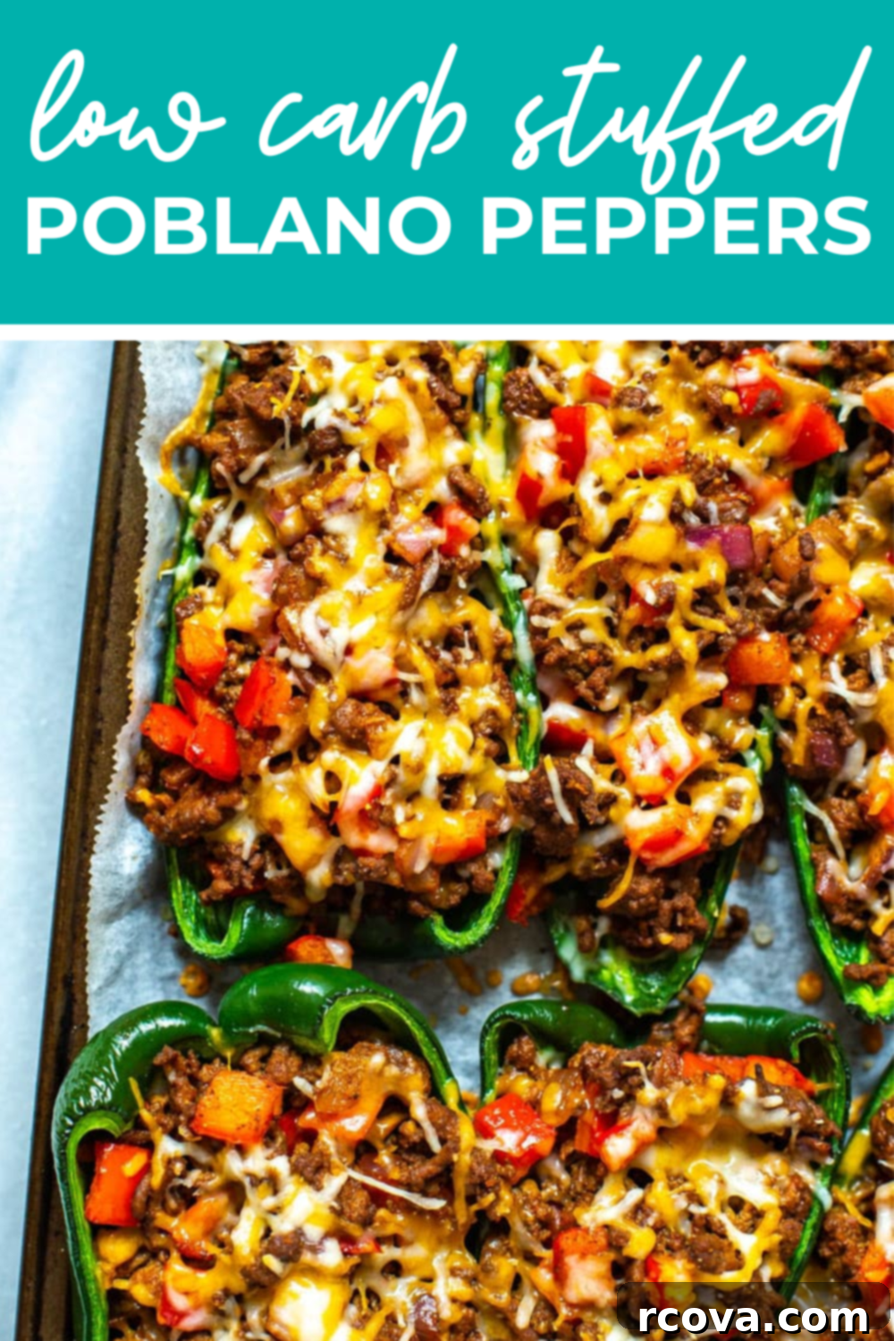 Keto Friendly Stuffed Poblano Delight 13 A close-up shot of a single baked low-carb stuffed poblano pepper on a wooden board, with the text "Low Carb Stuffed Poblano Peppers" on top.