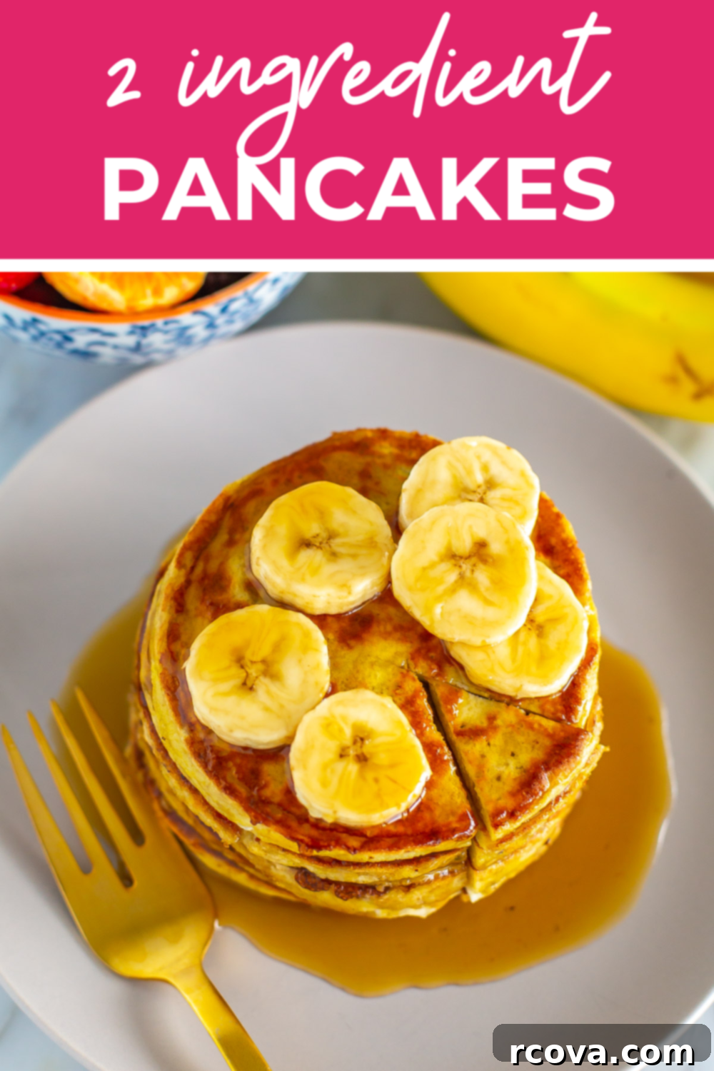 Effortless Two Ingredient Banana Egg Pancakes 11 Banana egg pancakes on a plate with the text "2 Ingredient Pancakes" on top.