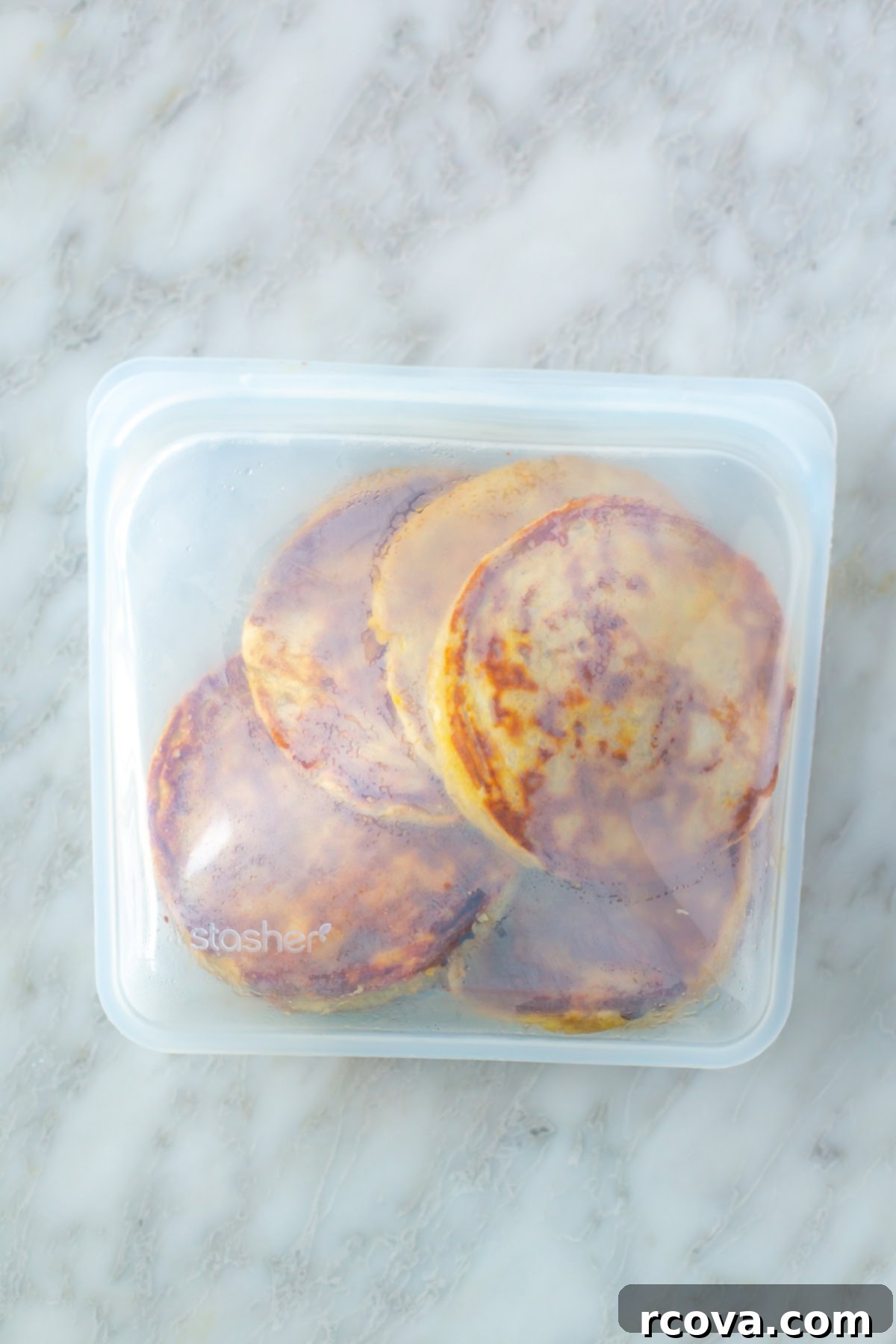 Effortless Two Ingredient Banana Egg Pancakes 9 A Stasher freezer bag with banana egg pancakes inside.