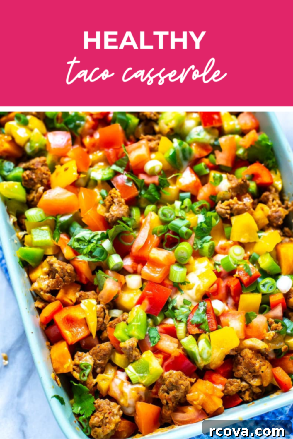 Wholesome Taco Bake 5 Overhead shot of the dish with pink banner on the top - reading "healthy taco casserole"