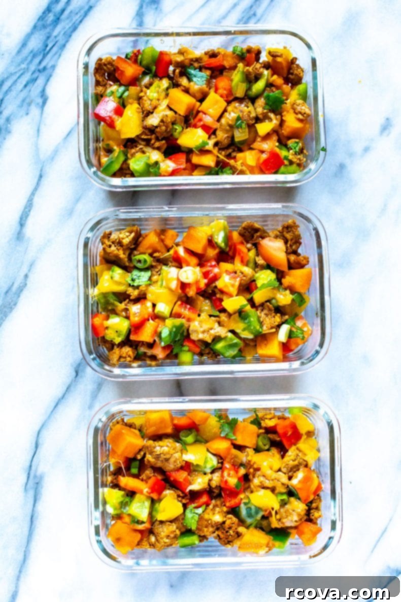 Healthy Ground Turkey Taco Bake portioned into meal prep containers, ideal for easy grab-and-go meals. Various meal prep containers with healthy taco casserole, showcasing different topping options.