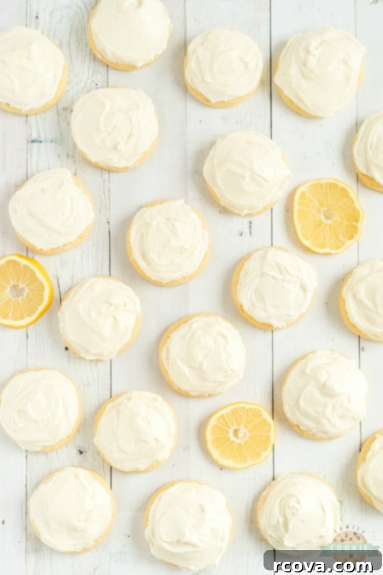 Vibrant Lemon Jello Sugar Cookies 9 Frosted lemon jello sugar cookies arranged artfully on a white plate