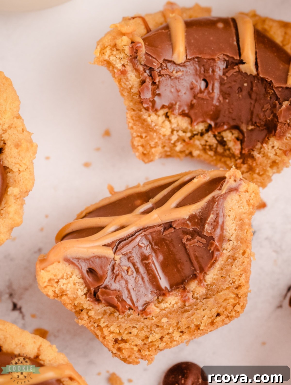 Decadent Peanut Butter Fudge Cookie Cups 3 peanut butter fudge cookies with a bite taken out