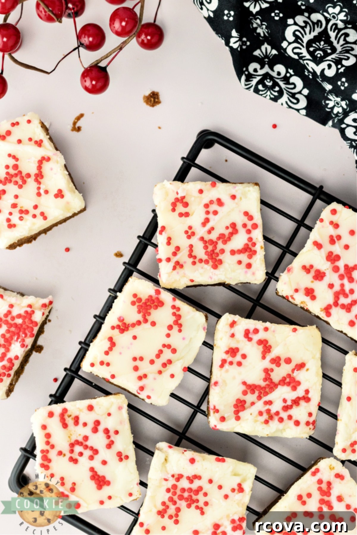 Chewy Spiced Gingerbread Bars 15 Sliced gingerbread cookie bars with frosting and sprinkles.