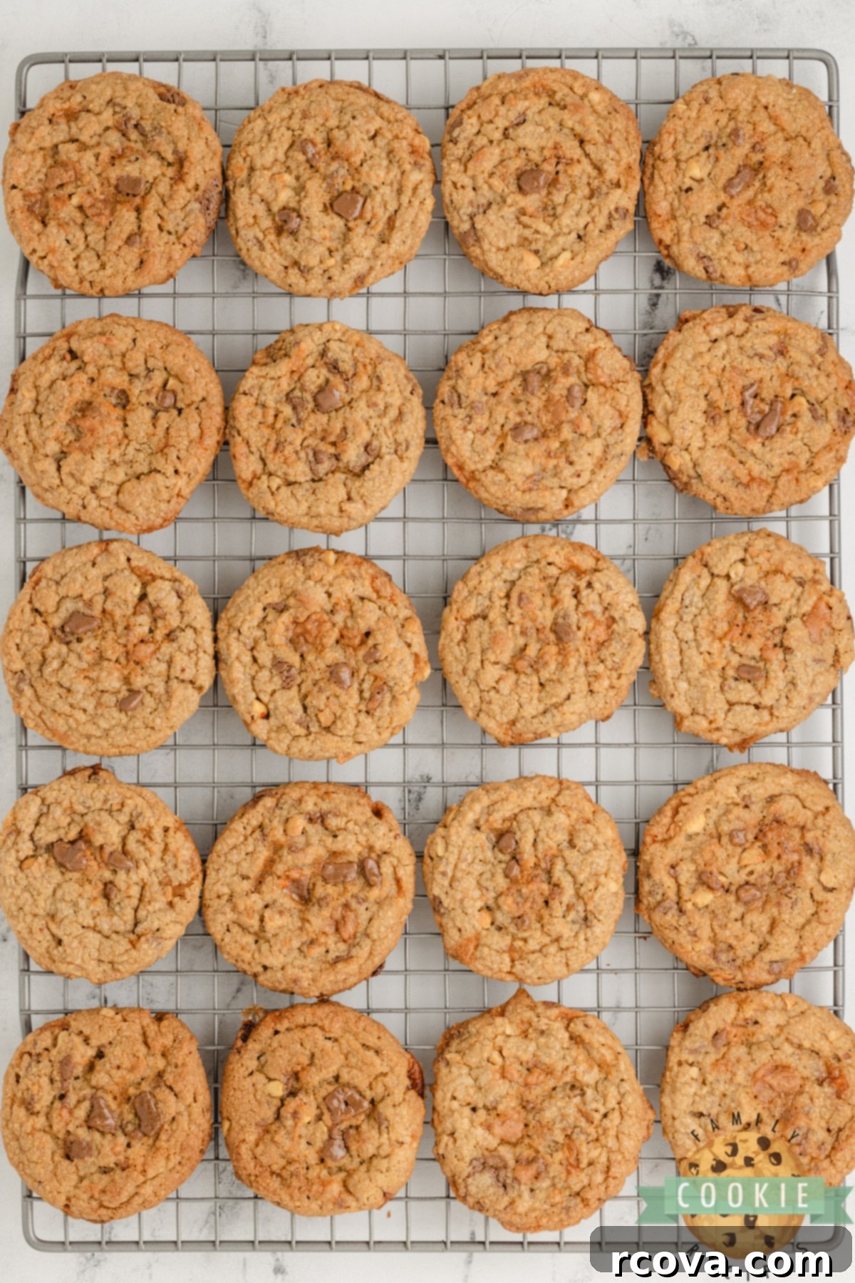 Butterfinger Peanut Butter Crunch Cookies 6 Cookies cooling on a wire rack.