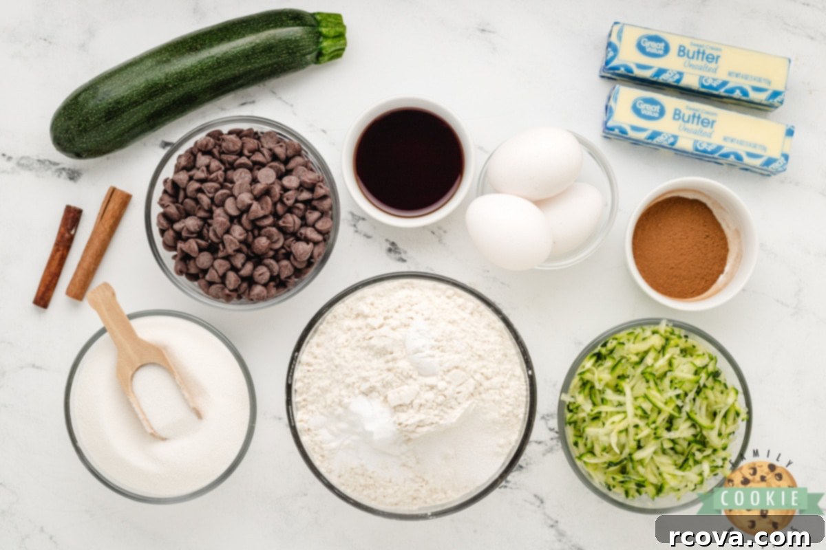Hidden Veggie Chocolate Chip Delights 3 Various baking ingredients laid out for making Zucchini Chocolate Chip Cookies, including grated zucchini, flour, sugar, and chocolate chips.