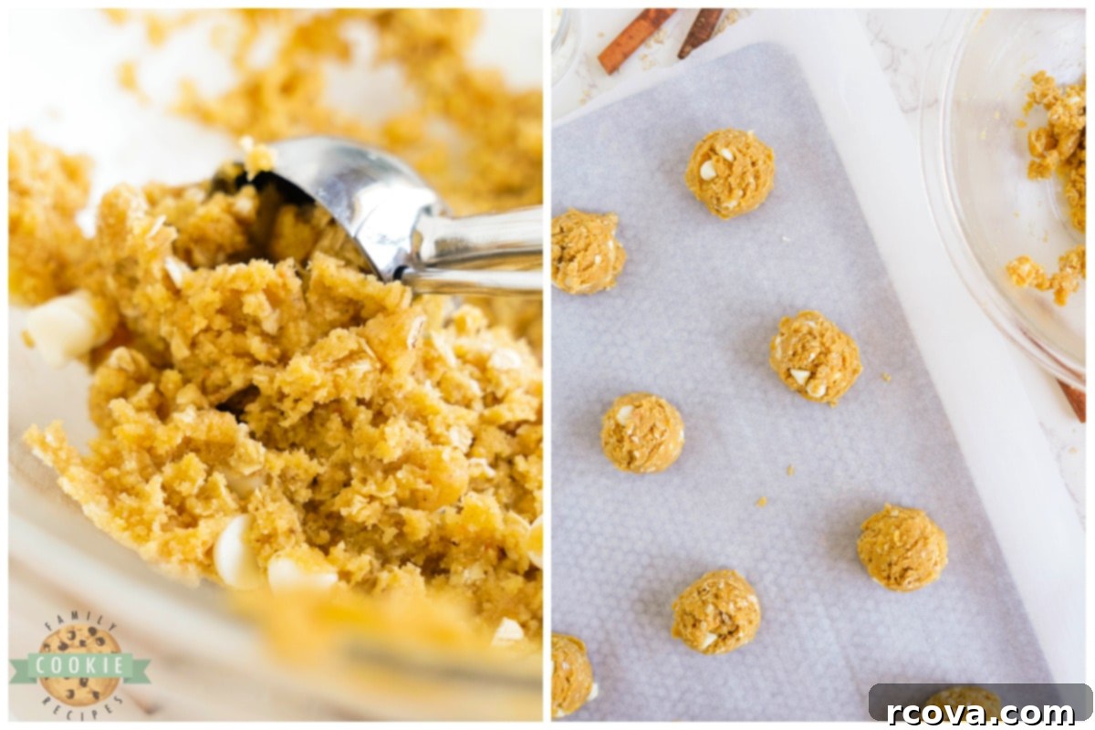 Golden Pumpkin White Chocolate Oat Jewels 10 Scooping uniform cookie dough balls onto a parchment paper-lined baking sheet for even baking.