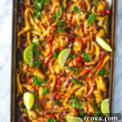 Effortless Sheet Pan Chicken Fajitas 7 Sheet pan chicken fajitas, freshly baked and ready to serve, featuring colorful peppers, tender chicken, and melted cheese.