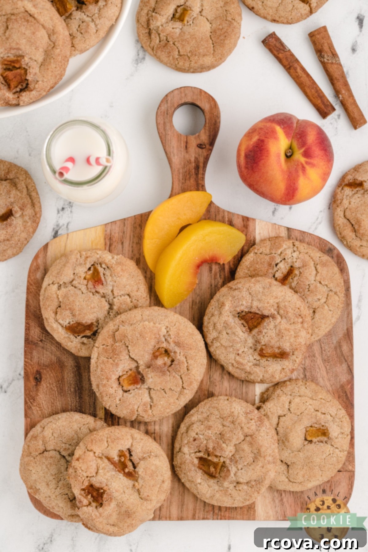Golden Peach Snickerdoodle Delights 8 Soft Peach Snickerdoodle Cookies scattered on a rustic wooden surface, highlighting their texture and fresh peach inclusions