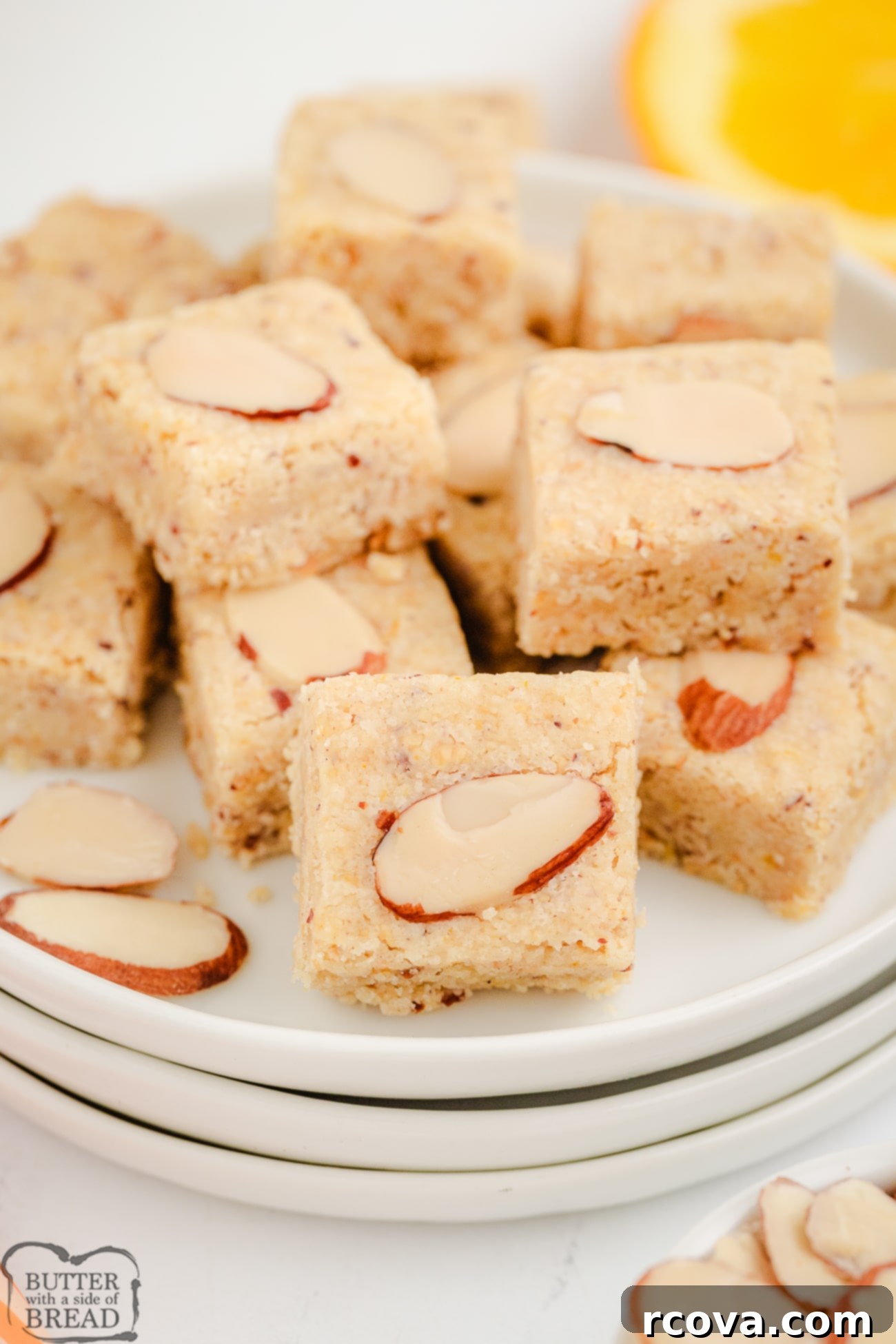 Zesty Almond Shortbread Delights 7 citrus almond shortbread squares on a plate