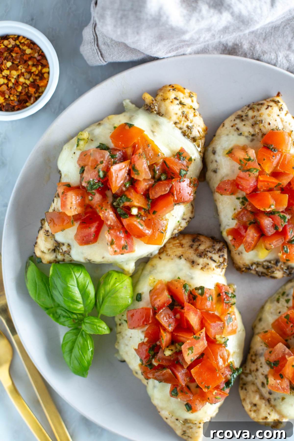 How to Meal Prep for Weight Loss with a Diet Plan 10 Three chicken breasts with bruschetta on a plate