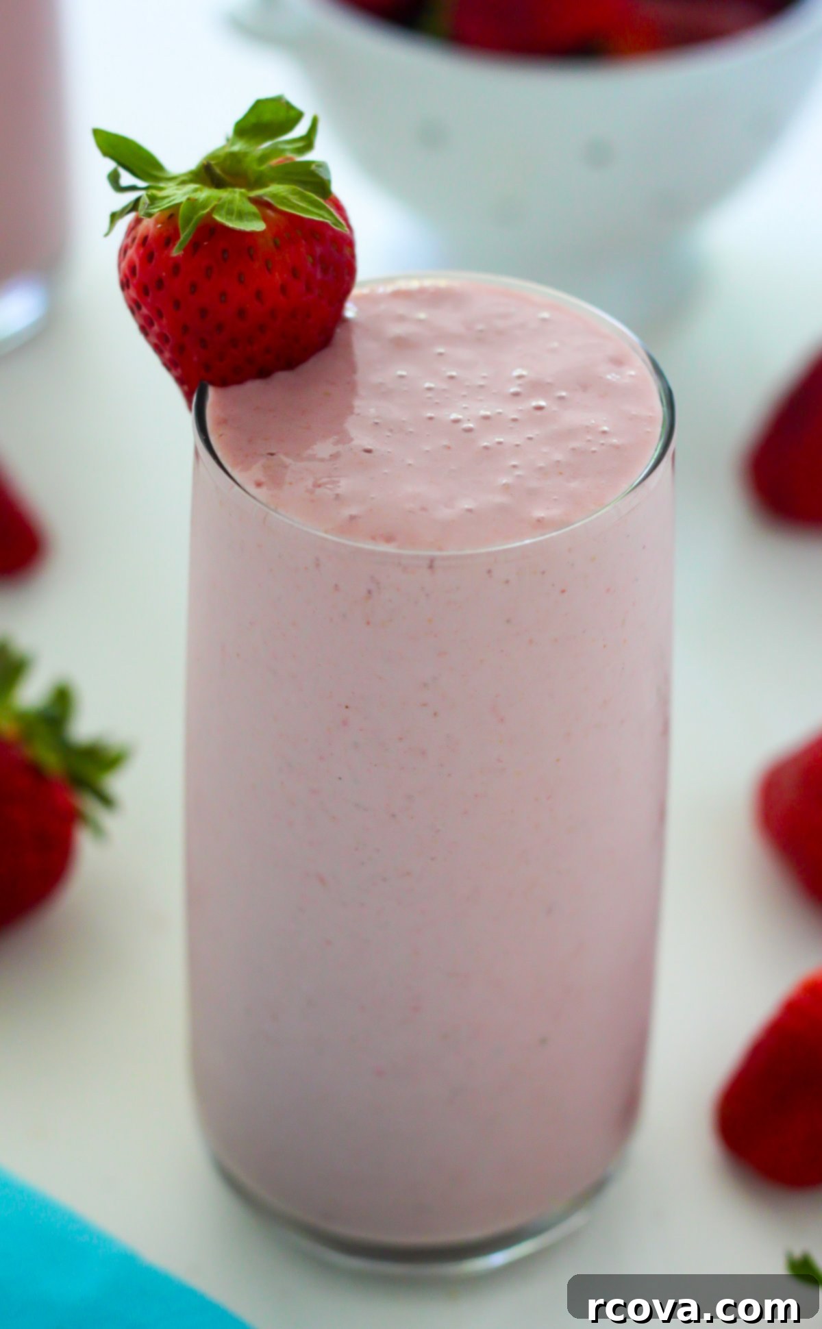 Power-Packed Protein Blends for Wellness 22 Strawberry Vanilla Smoothie via Baker by Nature, a sweet and creamy blend.