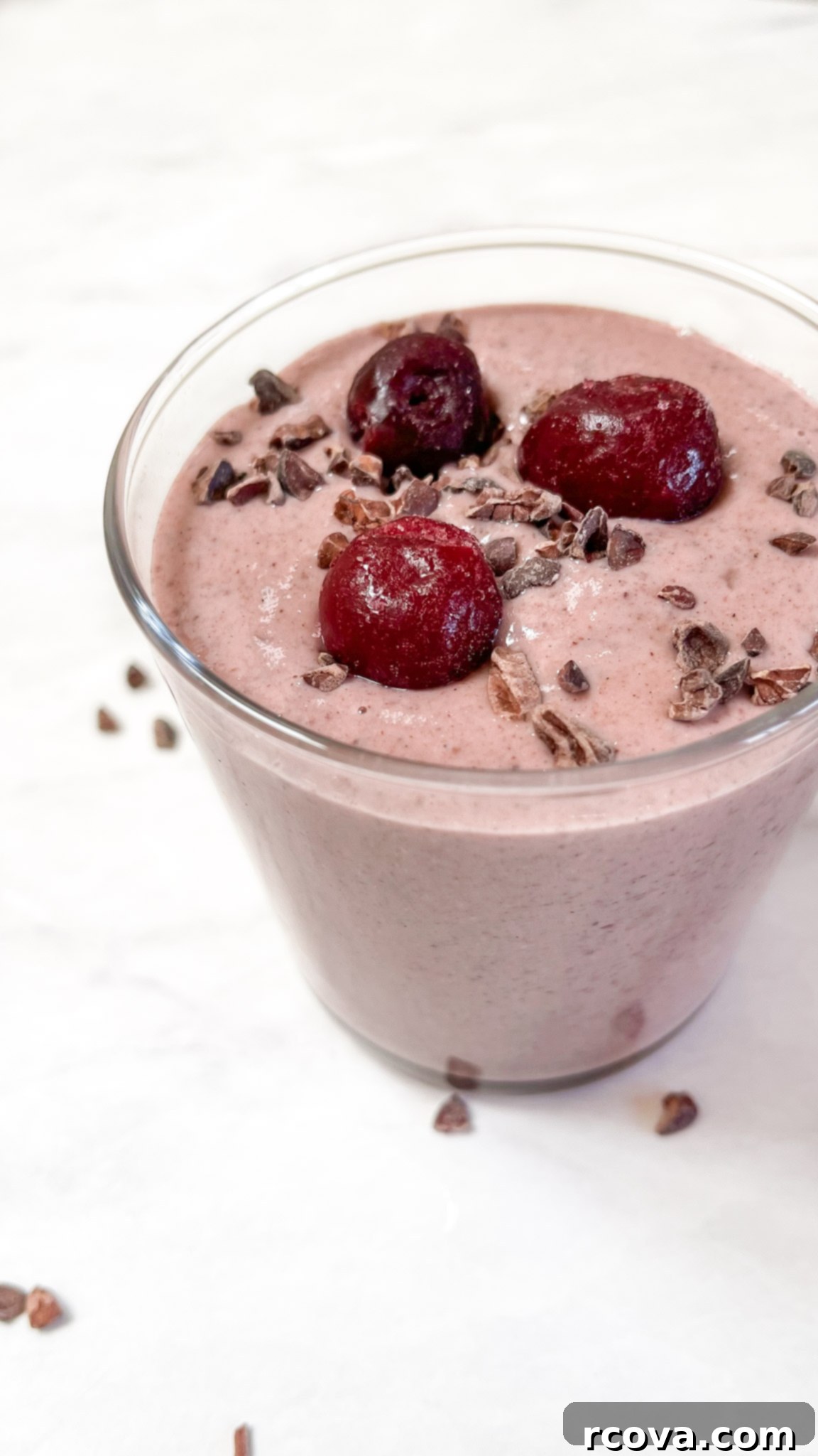 Power-Packed Protein Blends for Wellness 28 Vegan Cherry Garcia Smoothie via Liz Moody, a healthy dessert alternative.