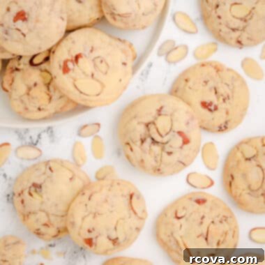 Buttery Toffee Almond Delights 5 Delicious Toffee Almond Sandies cookies, ready to be enjoyed.