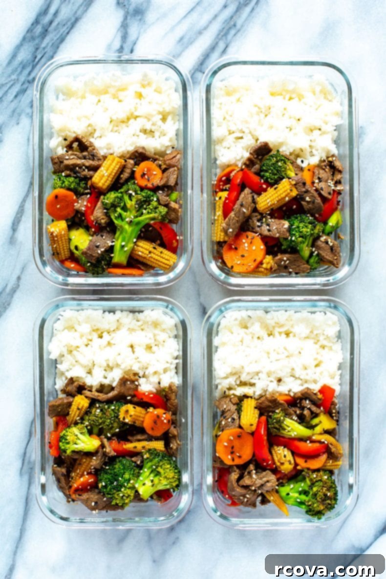 This is the EASIEST Beef Stir Fry recipe out there - with a simple 2-ingredient sauce, you'll likely already have all the ingredients you need to make this healthy dinner idea! #beefstirfry #skilletrecipe Four portions of meal-prepped Beef Stir Fry in glass storage containers, ready for the week.