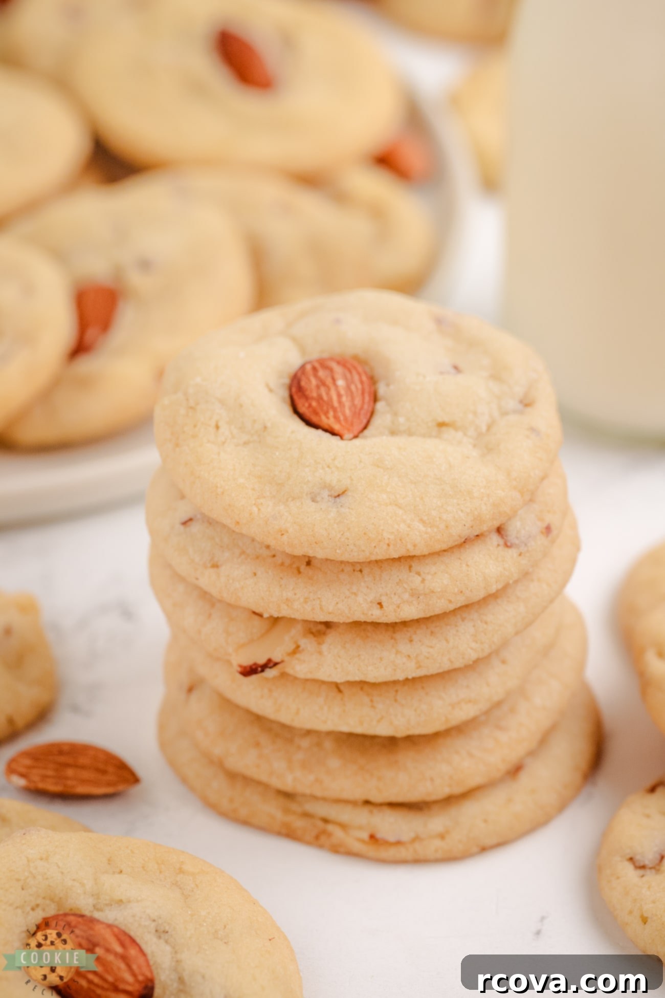 Golden Almond Delights 7 a delightful stack of golden-brown almond drop cookies, showcasing their inviting texture and rich color, perfect for a treat