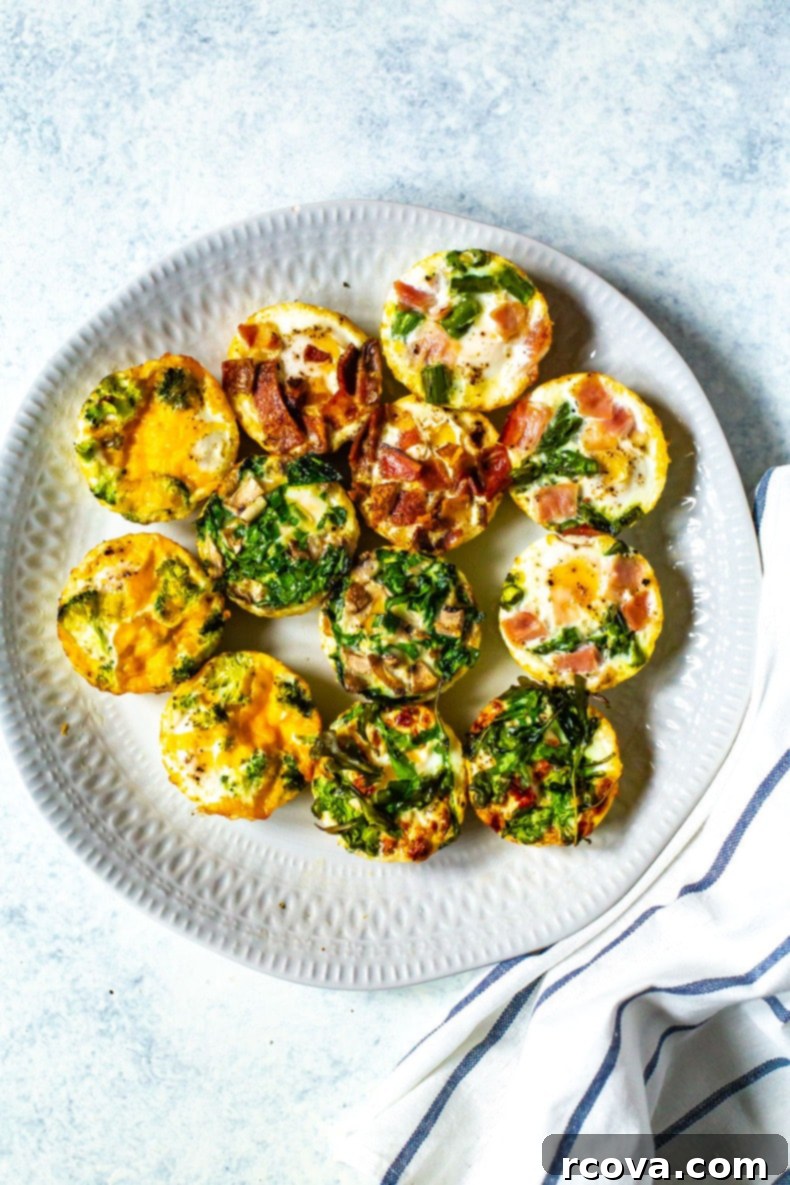 Make-Ahead Egg Bakes 2 A vibrant plate displaying a dozen baked eggs, each featuring distinct, delicious flavors, neatly arranged beside a crisp napkin. This showcases the incredible variety you can achieve with meal prep baked eggs.