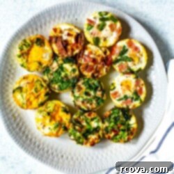 Make-Ahead Egg Bakes 10 A plate filled with a dozen baked eggs in different flavours pictured next to a napkin.