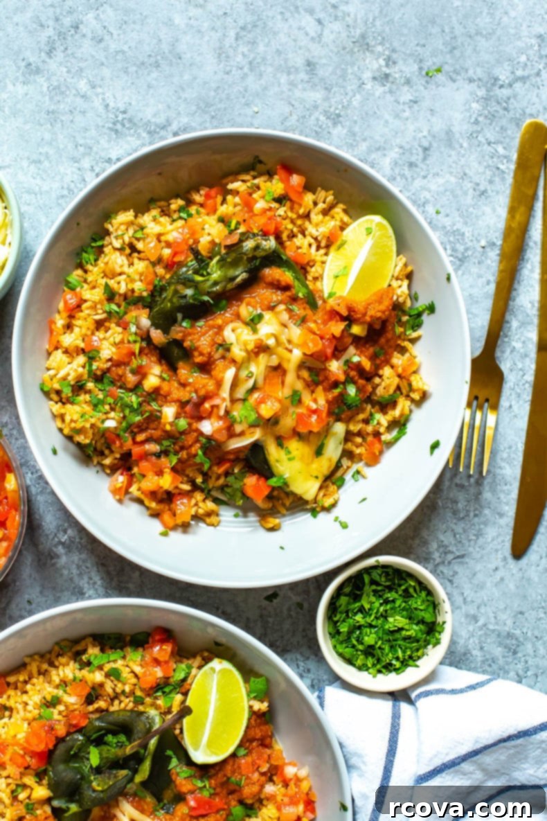 Quick & Flavorful Chile Rellenos 6 Skinny Chile Rellenos with melted cheese plated over Mexican rice with pico de gallo overtop. Bowl of cilantro on the side.