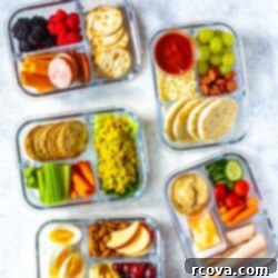 5 No-Fuss Bento Box Lunches 11 Five healthy bento lunch boxes photographed from an angle, showcasing variety.