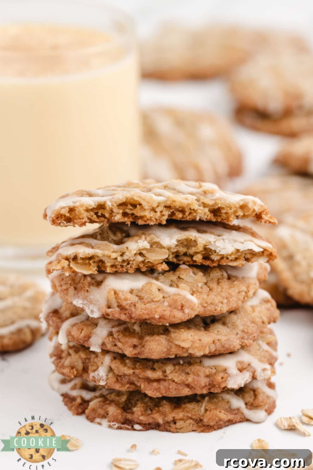 Spiced Eggnog Oatmeal Cookies 12 A tall stack of perfectly baked Eggnog Oatmeal Cookies, showing off their soft centers and inviting glaze.