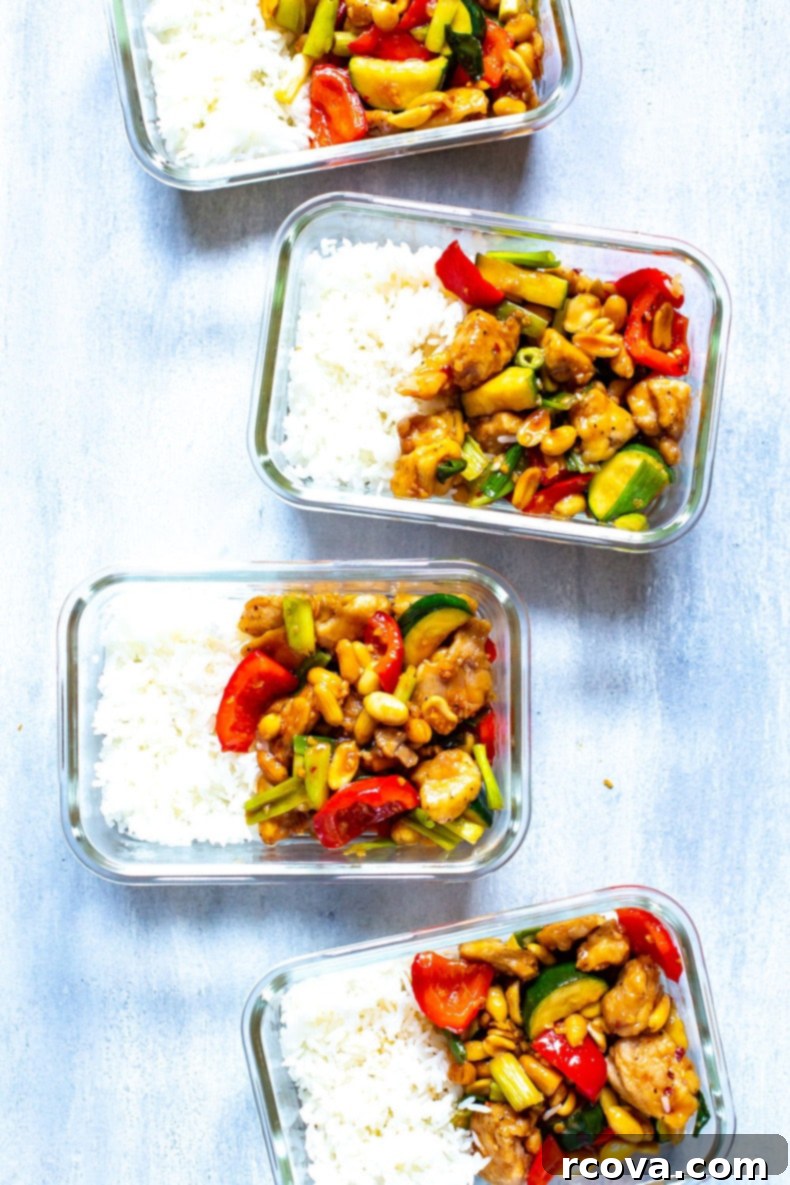 The Best Homemade Panda Express Kung Pao Chicken 4 A close-up shot of the stir-fried Kung Pao chicken and vegetables in a pan, showcasing the rich sauce and tender ingredients.