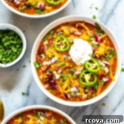 Lean & Hearty Slow Cooker Turkey Chili 9 Healthy, Flavourful Slow Cooker Turkey Chili in a round bowl