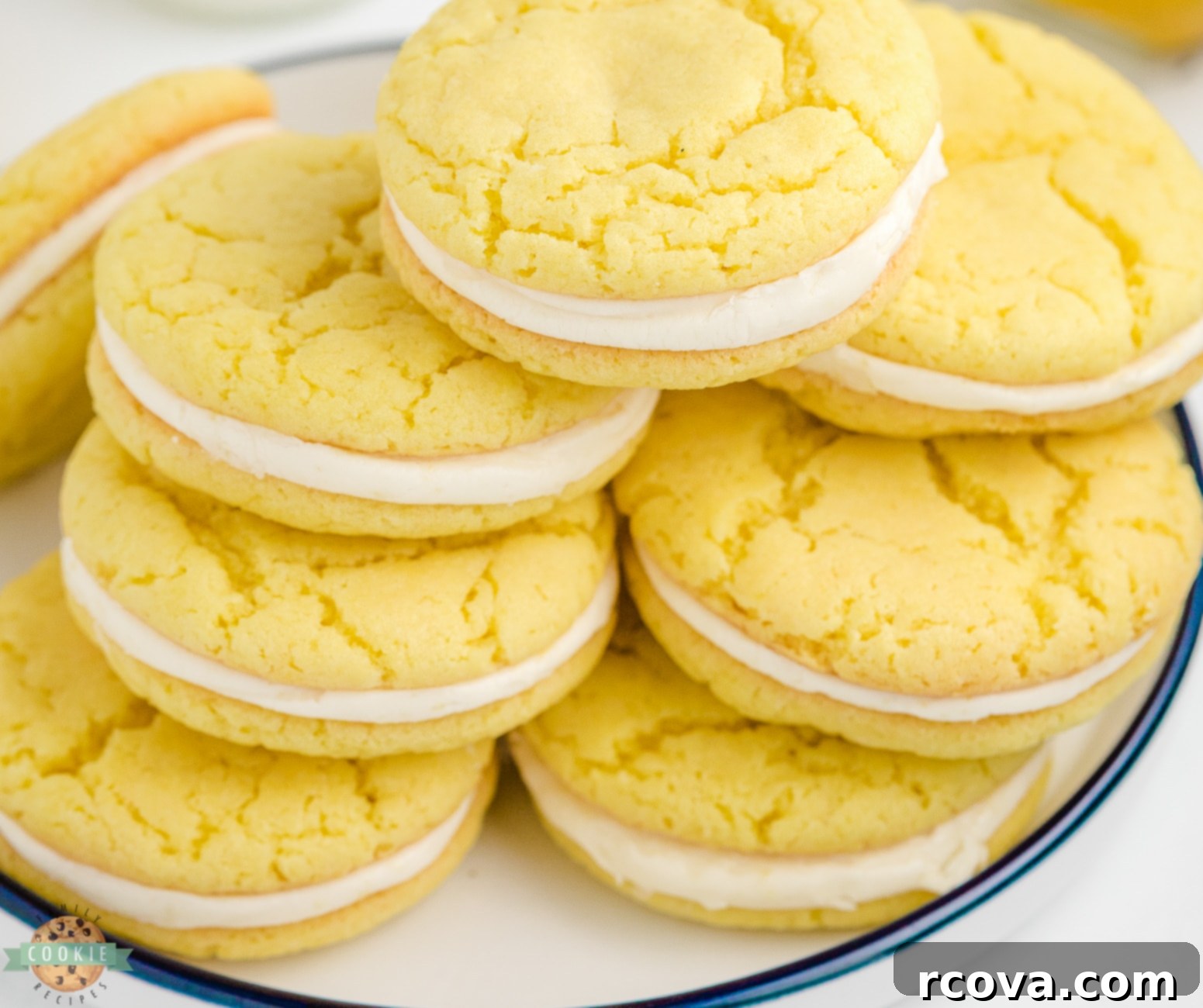 Zesty Lemon Oreo Cake Mix Cookies 5 homemade lemon oreos on a plate