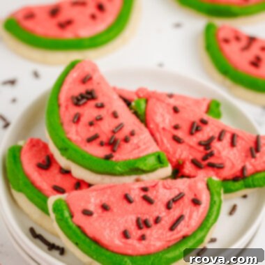 Summer Kissed Watermelon Cookies 5 plateful of frosted watermelon cookies, cut into slices