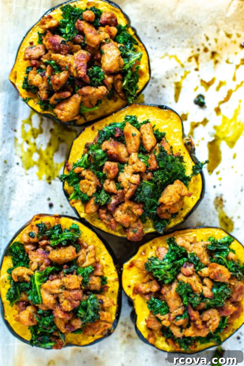 Savory Sausage and Kale Stuffed Acorn Squash 2 Beautifully roasted acorn squash halves filled with savory turkey sausage and vibrant kale, ready to eat.