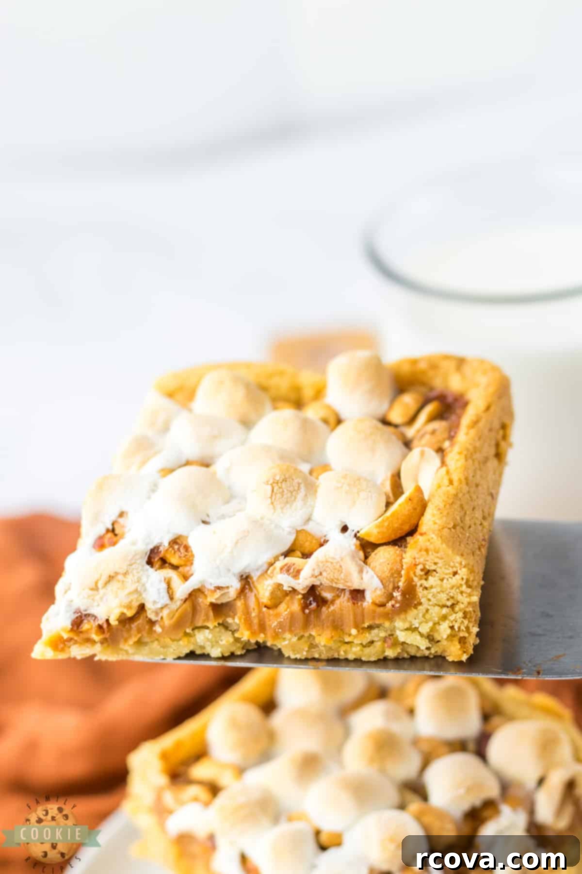 Irresistible Peanut Caramel Cookie Bars 13 Close-up of an easy 5-ingredient cookie bar recipe, showcasing the layers of sugar cookie, caramel, peanuts, and marshmallows