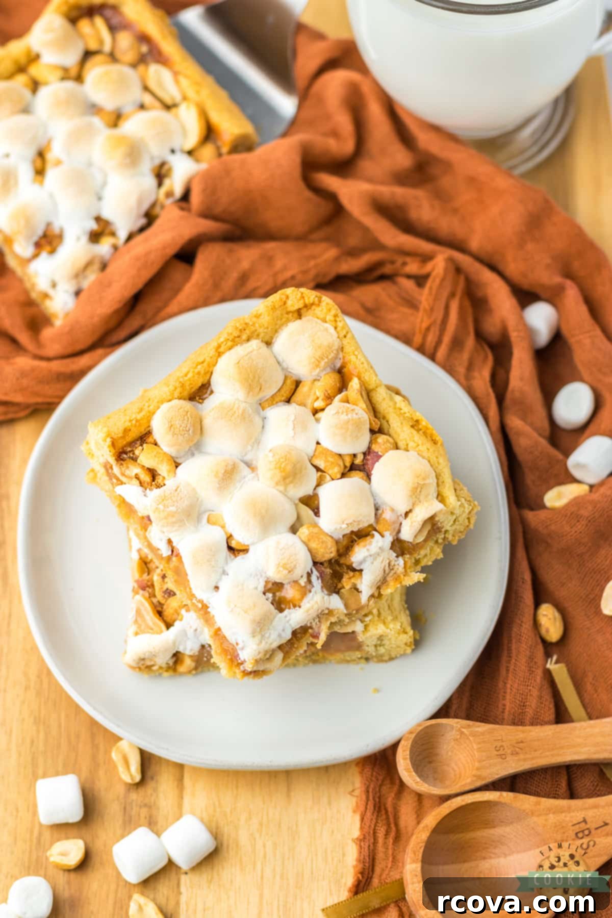 Irresistible Peanut Caramel Cookie Bars 6 Stack of freshly baked cookie bars featuring decadent caramel and crunchy peanuts