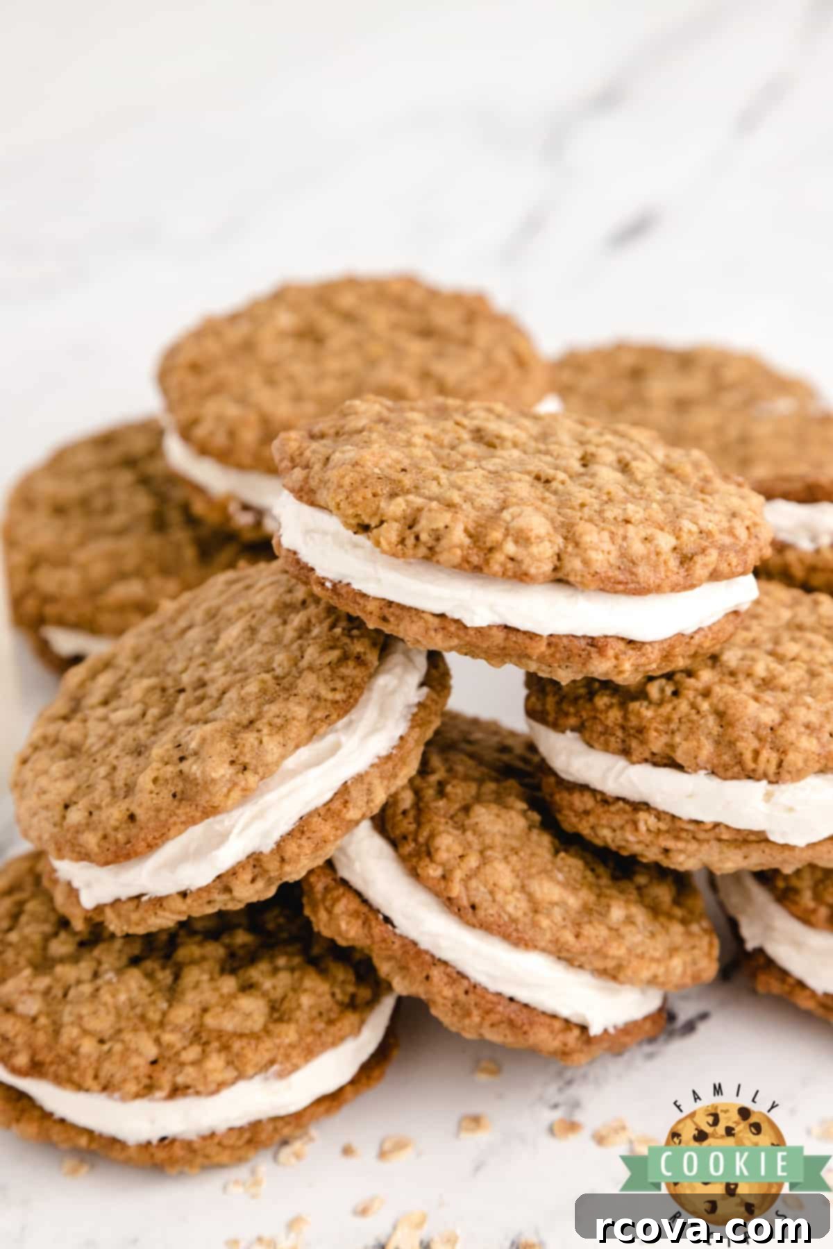 Dreamy Oatmeal Cream Cookies 3 Soft and chewy oatmeal sandwich cookies with creamy marshmallow buttercream filling, ready to be served
