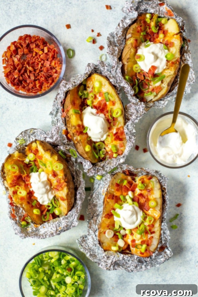 Set and Forget Crockpot Potatoes 2 Crockpot Baked Potatoes piled high with delicious toppings like sour cream, crispy bacon, and fresh green onions