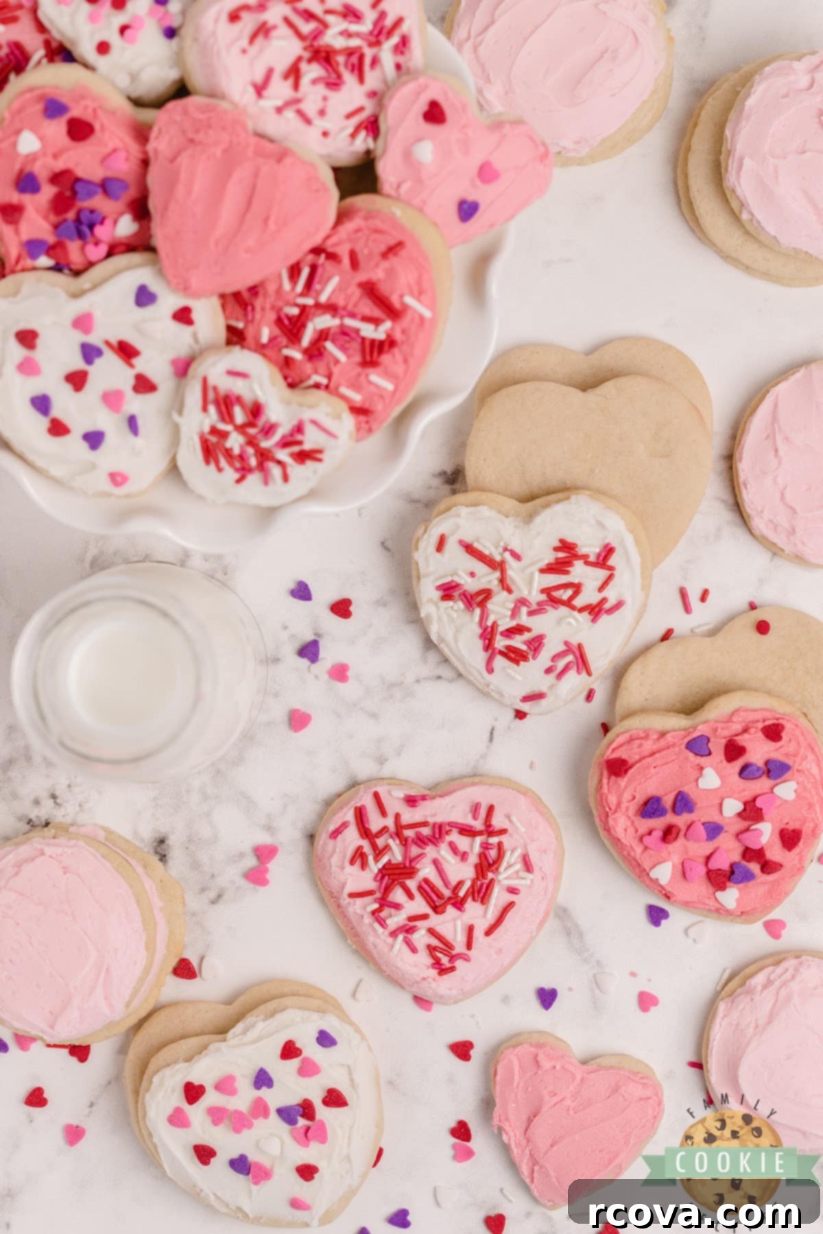 Love-Infused Sugar Delights 4 Freshly baked heart-shaped sugar cookies cooling on a wire rack, perfectly holding their shape.