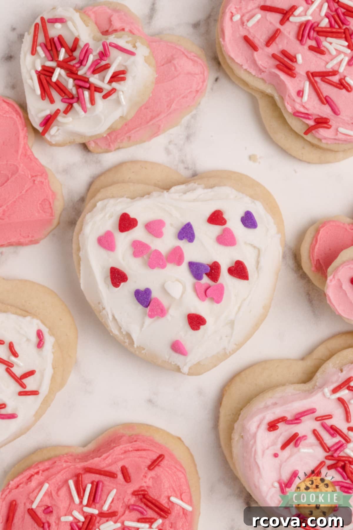 Love-Infused Sugar Delights 6 A plate of freshly frosted soft sugar cookies, beautifully decorated for Valentine's Day.